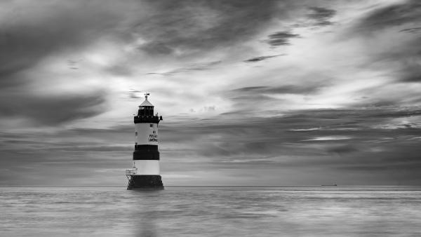 Lighthouse and Distant Ship